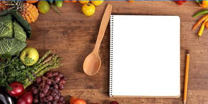 Notebook, grøntsager og frugter