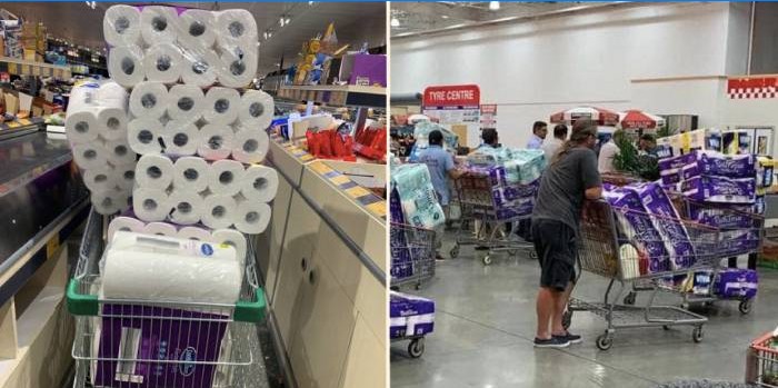 Ruller toiletpapir i indkøbskurve