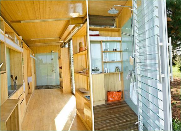 Køkkenområdet i Port-A-Bach-sommerhuset i bærbar container