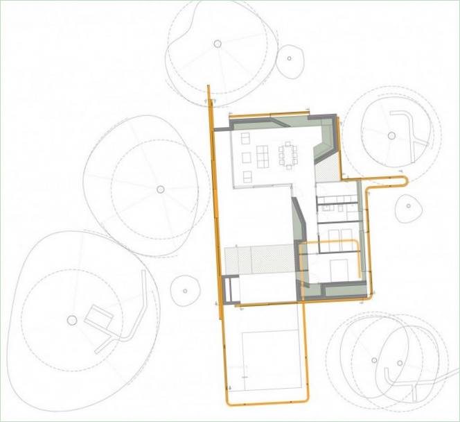 Design af et hus omgivet af en skov i Spanien