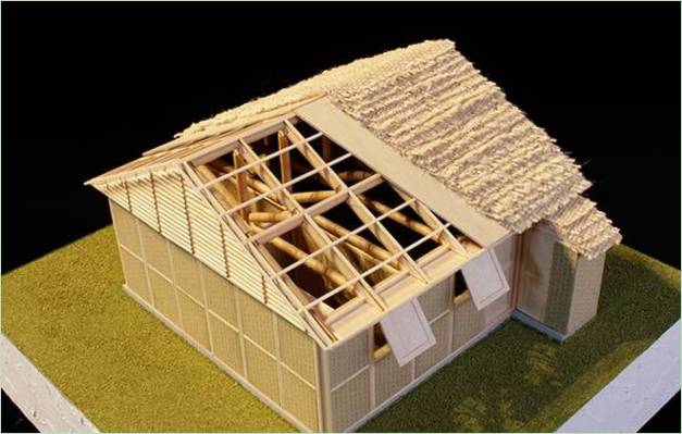Genbrugspap og murbrokker i husets design