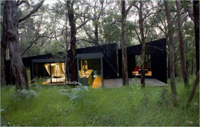 Red Hill hytten i skoven er et smukt design