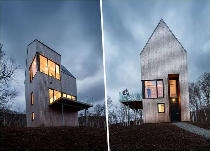 Hus med træfacade af Design Base 8: Det usædvanlige tag Et hus med en træfacade af Design Base 8: Taget er ekstraordinært