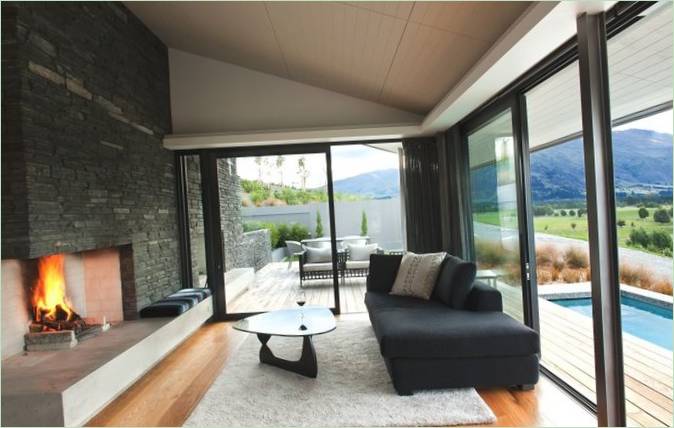 Indretning af stue med pejs Wanaka Residence i New Zealand